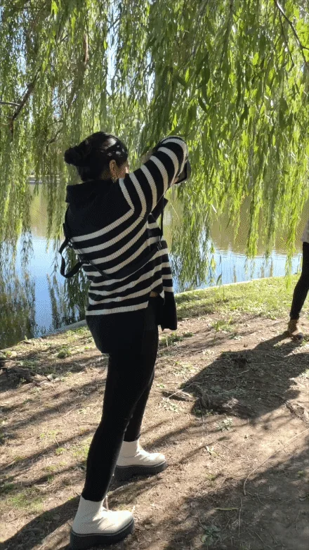 Proposal photographer documenting a couple in Constitution Gardens