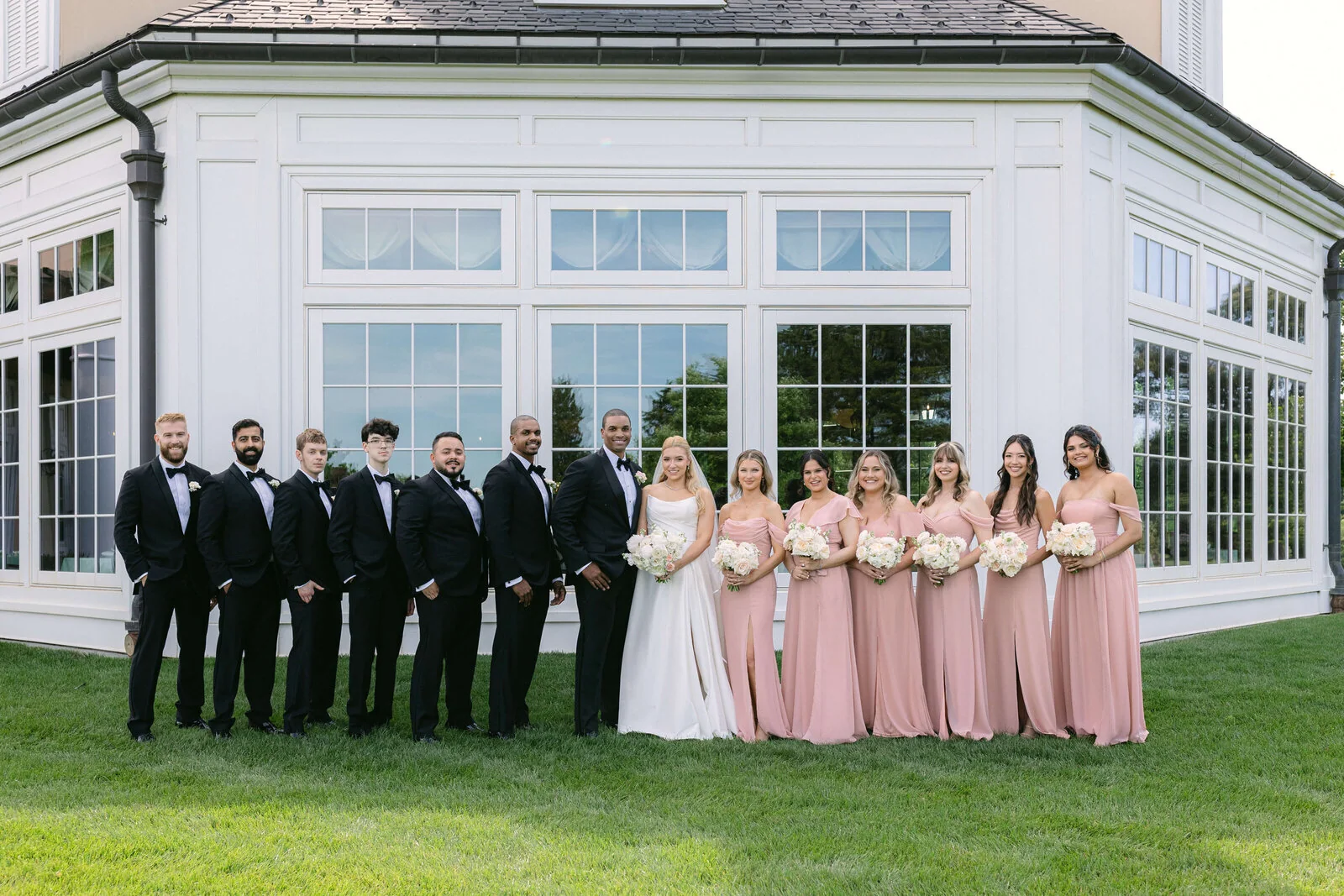Alexandra and Donovan with their wedding party at Salamander Resort