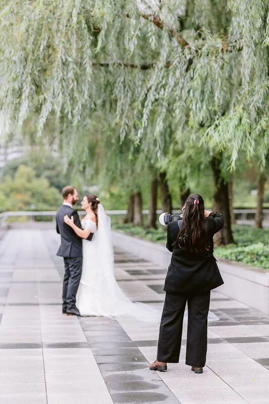 Barbara photographing a newlywed couple at the Kennedy Center