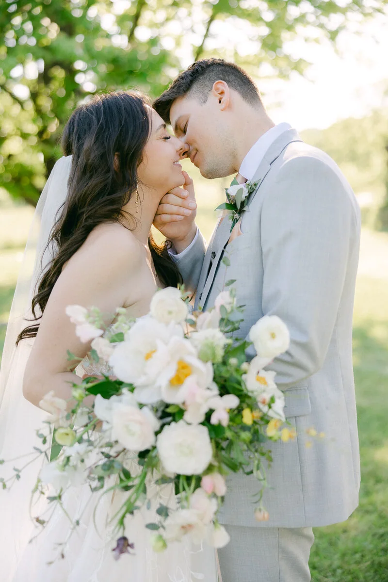 A bride and groom sharing a quiet moment outdoors