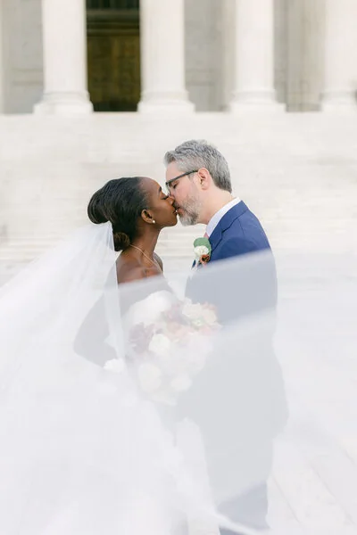 Maryline and Tim on their wedding day at The Darcy Hotel